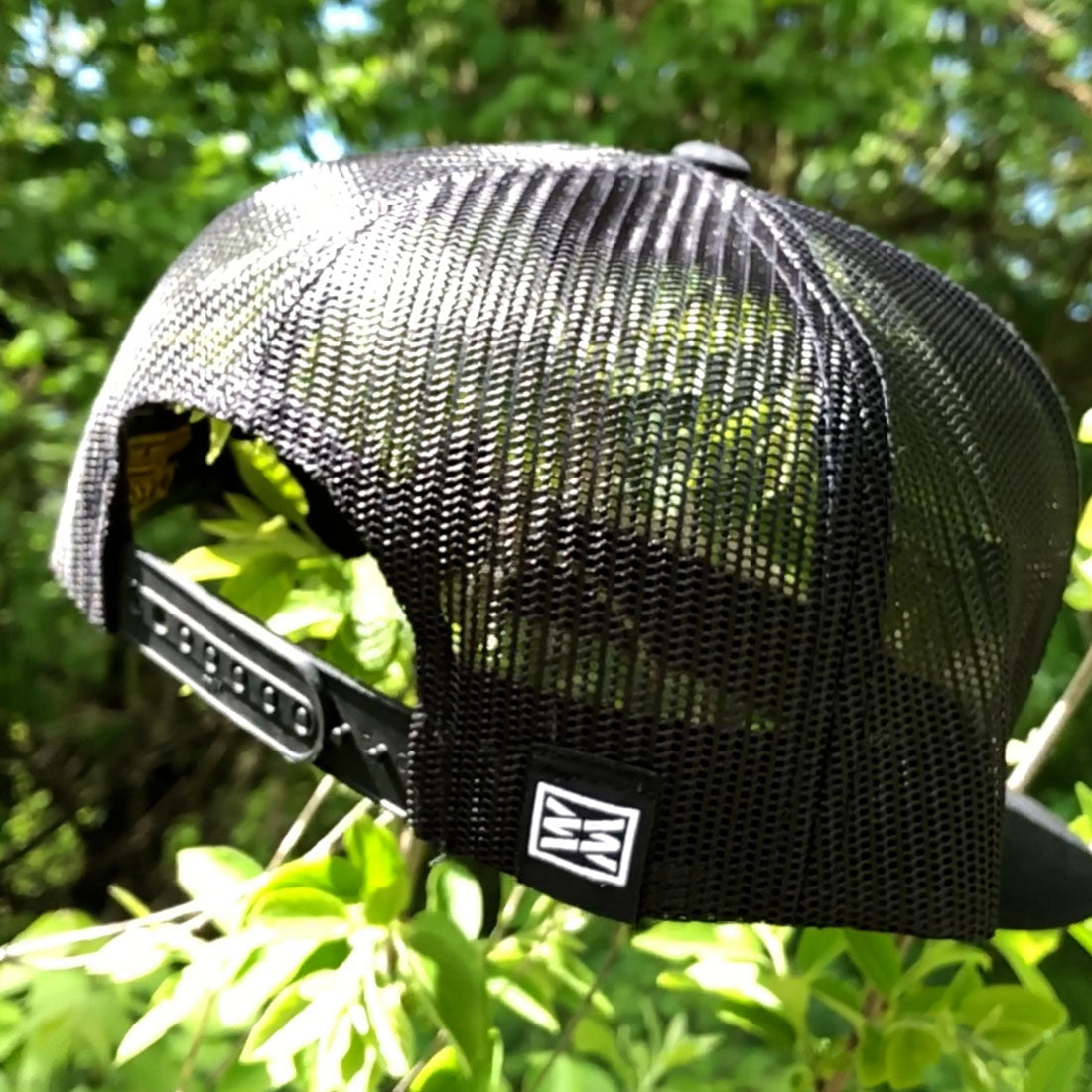 GOOD TIMES FLAT BILL TRUCKER HAT IN BLACK