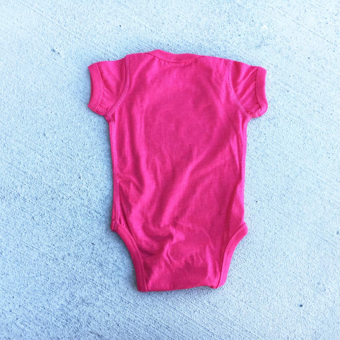 ELI FAST BABY ONESIE HEATHER HOT PINK