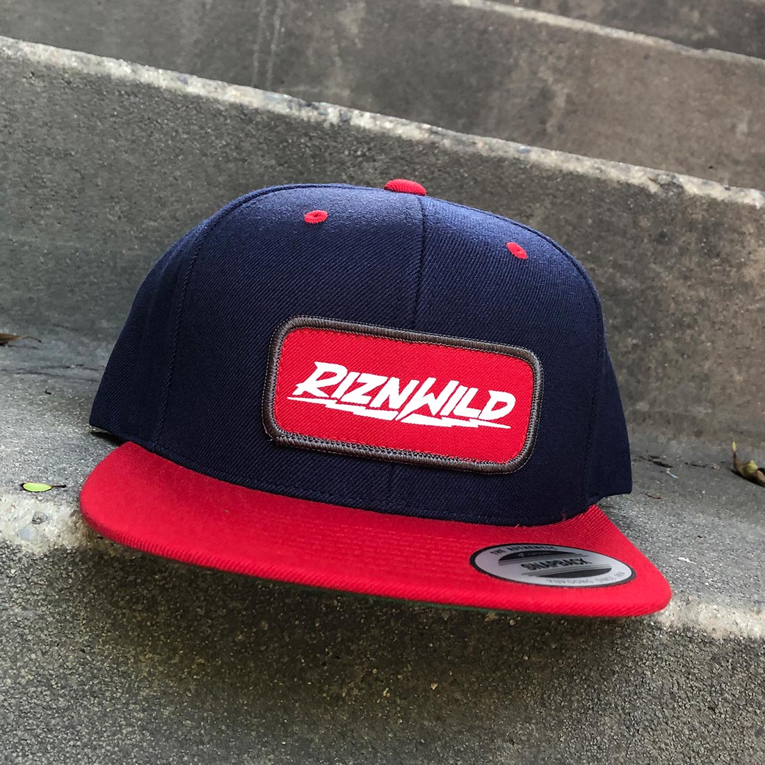RIZNWILD | Red White and Grey patch on a flex fit hat